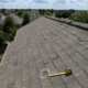 Wide angle view of hail damage on a residential roof in Dallas-Fort Worth