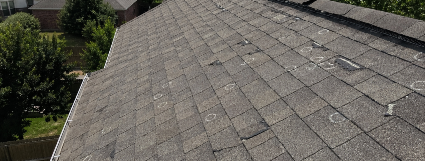 Wide angle view of hail damage on a residential roof in Dallas-Fort Worth
